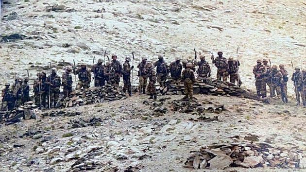 In this September 8 file photo, Chinese soldiers armed with stick-machetes during their deployment along the Line of Actual Control in Eastern Ladakh sector.(ANI photo)