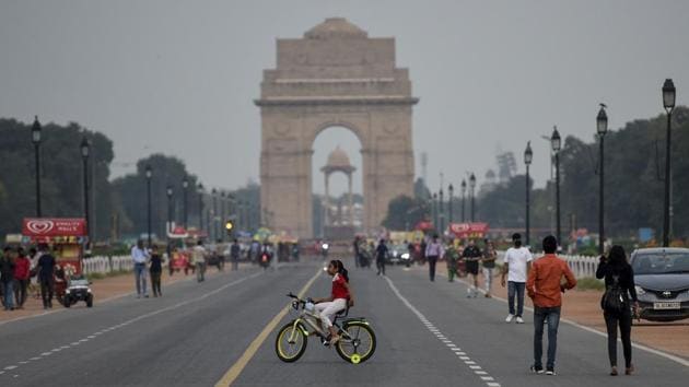 A child cycles on Rajpath near India Gate in New Delhi on September 19. Experts believe strict adherence to Covid-19 protocols in both the cities has helped keep the Covid-19 numbers low. While going out in the middle of a raging pandemic is always risky, following protocols--like wearing a mask--gives one the best possible chance to avoid catching the infection, HT reported. (Biplov Bhuyan / HT Photo) 