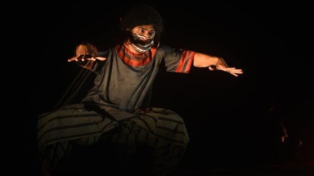 An actor portrays the play’s eponymous demon Jwarasur, during final dress rehearsals at EZCC in Kolkata on September 20. The title ‘Jwarasur Badh’ translates to ‘the slaying of the fever demon’. Jwarasur is considered the demon associated with fevers in mythology. (Samir Jana / HT Photo) An actor portrays the play’s eponymous demon Jwarasur, during final dress rehearsals at EZCC in Kolkata on September 20. The title ‘Jwarasur Badh’ translates to ‘the slaying of the fever demon’. Jwarasur is considered the demon associated with fevers in mythology. (Samir Jana / HT Photo)