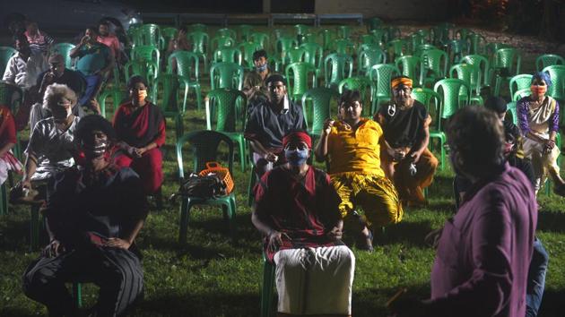 Director Soumitra Mitra with the play’s cast during final dress rehearsals on September 20. Adaptations to Covid-19 also extend to the audience. The seating arrangements have been limited to 100 people to ensure social distancing in the EZCC’s grounds. Ticket sales have also been restricted to online platforms. (Samir Jana / HT Photo) Director Soumitra Mitra with the play’s cast during final dress rehearsals on September 20. Adaptations to Covid-19 also extend to the audience. The seating arrangements have been limited to 100 people to ensure social distancing in the EZCC’s grounds. Ticket sales have also been restricted to online platforms. (Samir Jana / HT Photo)