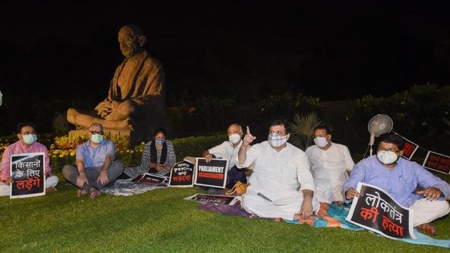 Derek O'Brien of Trinamool Congress and other Opposition members stage a protest over the suspension of eight Rajya Sabha members, farmers' problems and other issues on Monday night. (PTI) Derek O'Brien of Trinamool Congress and other Opposition members stage a protest over the suspension of eight Rajya Sabha members, farmers' problems and other issues on Monday night. (PTI)