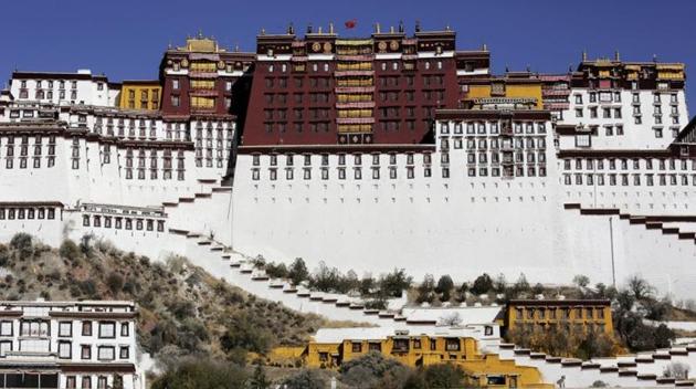 File photo of a paramilitary policeman standing guard in front of the Potala Palace in Lhasa, Tibet Autonomous Region.(Reuters file) File photo of a paramilitary policeman standing guard in front of the Potala Palace in Lhasa, Tibet Autonomous Region.(Reuters file)