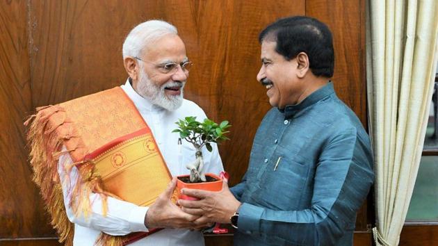 Prime Minister Narendra Modi with Minister of state for railways, Suresh Angadi (Photo: Twitter)