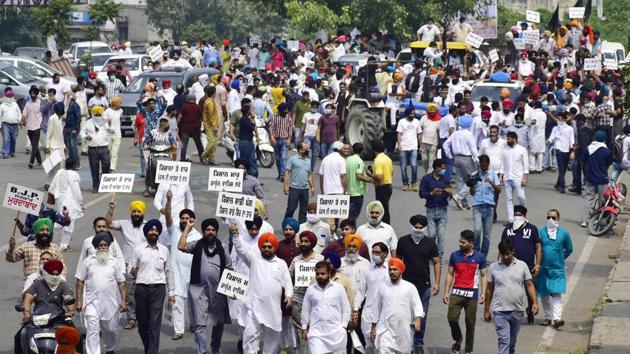 Congress workers march against the farm bills during a protest rally from Bhandari Bridge to Hall gate, in Amritsar, Punjab, India, on Wednesday, September 23, 2020.(Photo by Sameer Sehgal/Hindustan Times)