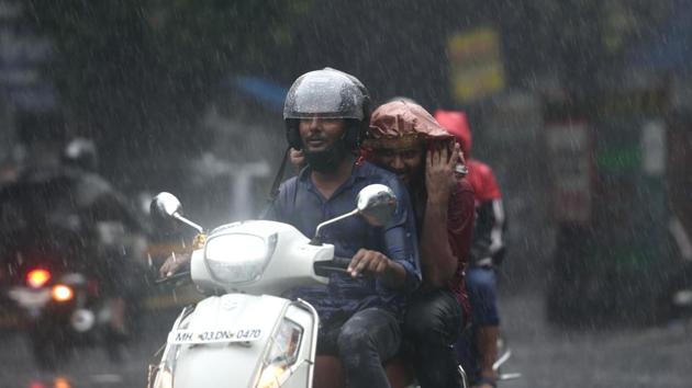 Commuters in the rain at Bhandup in Mumbai on September 23. On September 20, 2016, Mumbai had recorded 303.7mm rain. Prior to that, 312.4mm rain was recorded on September 23, 1993 and 318.2mm rain on September 23, 1981, HT reported. (Satish Bate / HT Photo) Commuters in the rain at Bhandup in Mumbai on September 23. On September 20, 2016, Mumbai had recorded 303.7mm rain. Prior to that, 312.4mm rain was recorded on September 23, 1993 and 318.2mm rain on September 23, 1981, HT reported. (Satish Bate / HT Photo)