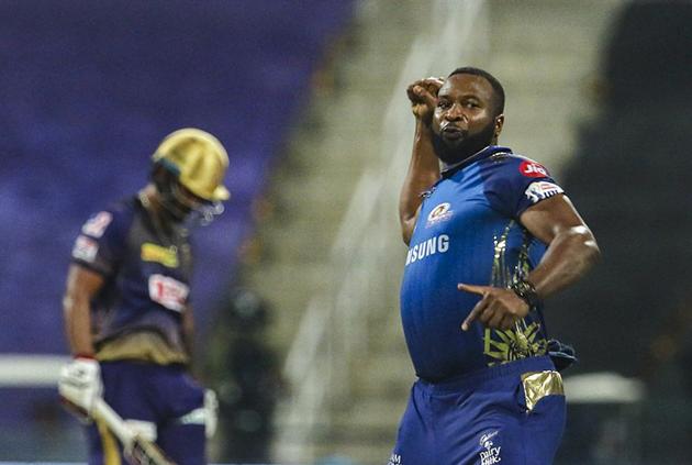 Abu Dhabi: Mumbai Indians player Kieron Pollard celebrates the wicket of Kolkata Knight Riders batsman Nitish Rana during IPL 2020 cricket match, at Sheikh Zayed Stadium, in Abu Dhabi of United Arab Emirates, Wednesday, Sept. 23, 2020. (PTI Photo/Sportzpics)(PTI23-09-2020_000293B) (PTI) Abu Dhabi: Mumbai Indians player Kieron Pollard celebrates the wicket of Kolkata Knight Riders batsman Nitish Rana during IPL 2020 cricket match, at Sheikh Zayed Stadium, in Abu Dhabi of United Arab Emirates, Wednesday, Sept. 23, 2020. (PTI Photo/Sportzpics)(PTI23-09-2020_000293B) (PTI)