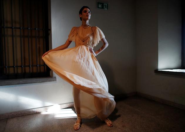 A model is seen on backstage before presenting creations from the Alberta Ferretti Spring/Summer 2021 women's collection during fashion week in Milan, Italy, September 23, 2020.  (REUTERS) 