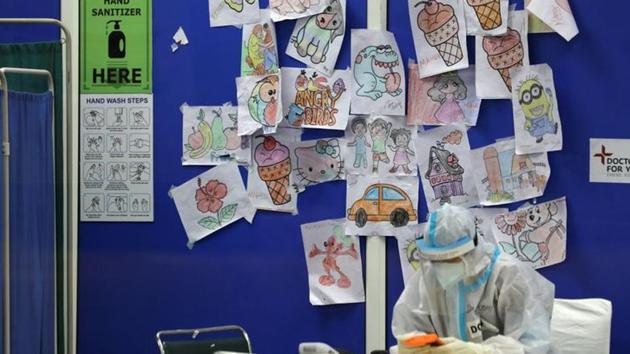 Kids' drawings are displayed on a panel inside a quarantine centre for the coronavirus disease (Covid-19) patients in New Delhi.(Reuters)