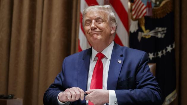 Trump said it “sounds like a political move” when asked whether the FDA was considering stricter standards for an authorization, suggesting that the White House could intercede if it thought the agency was too rigorous. (AP) Trump said it “sounds like a political move” when asked whether the FDA was considering stricter standards for an authorization, suggesting that the White House could intercede if it thought the agency was too rigorous. (AP)