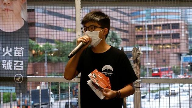 Joshua Wong tweeted that he was arrested when reporting to the semi-autonomous Chinese territory’s Central Police Station.(Reuters)