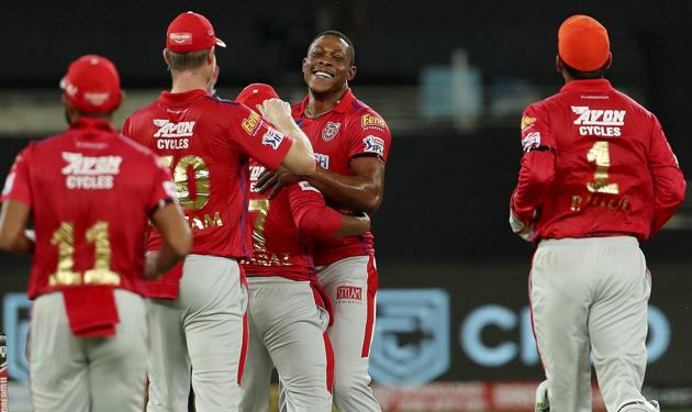 KXIP players celebrate their 97-run win over RCB in Dubai (PTI)
