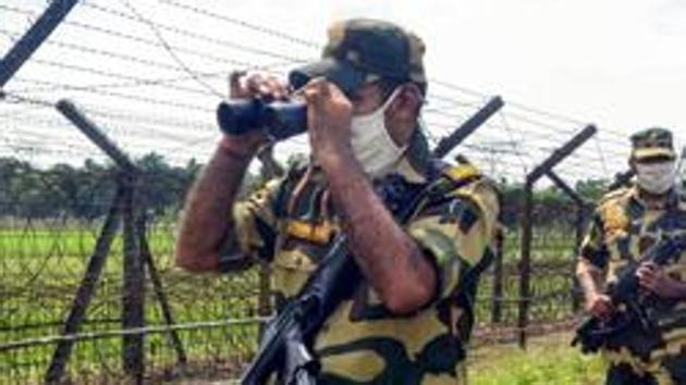 A BSF patrol along India-Bangladesh border in Siliguri. (PTI) A BSF patrol along India-Bangladesh border in Siliguri. (PTI)