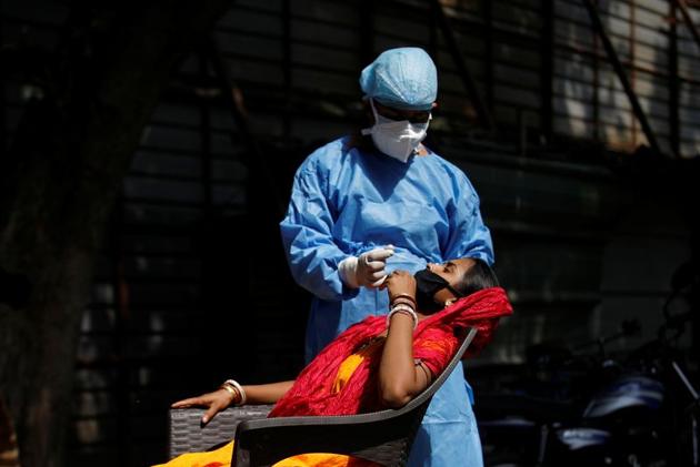 The number of tests conducted per million people in rural districts was 14,880, compared with 26,115 tests per million in urban districts(REUTERS PHOTO)