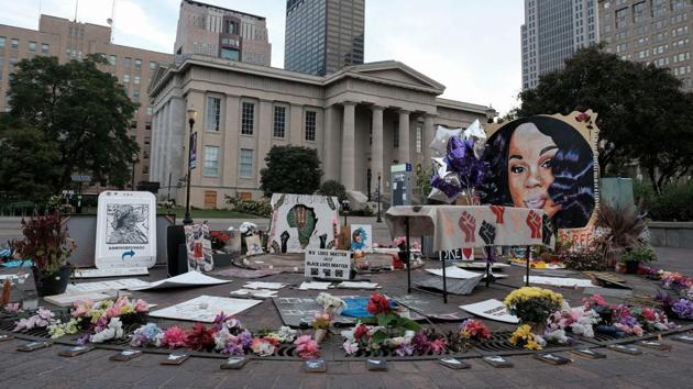 A memorial to Breonna Taylor in Jefferson Square Park, downtown Louisville, on September 23. Benjamin Crump, a prominent civil rights lawyer representing the Taylor family, denounced the outcome of the grand jury probe, saying it was “outrageous” that none of the three officers involved in the raid was criminally charged with causing Taylor’s death, Reuters reported. (Jeff Dean / AFP) A memorial to Breonna Taylor in Jefferson Square Park, downtown Louisville, on September 23. Benjamin Crump, a prominent civil rights lawyer representing the Taylor family, denounced the outcome of the grand jury probe, saying it was “outrageous” that none of the three officers involved in the raid was criminally charged with causing Taylor’s death, Reuters reported. (Jeff Dean / AFP)