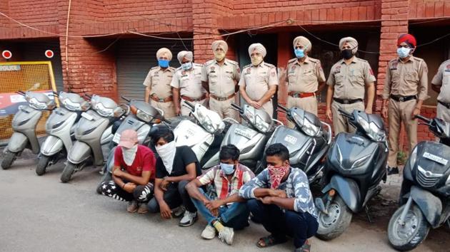Four men arrested for thefts and snatchings in Ludhiana police custody on Friday. (HT Photo) Four men arrested for thefts and snatchings in Ludhiana police custody on Friday. (HT Photo)