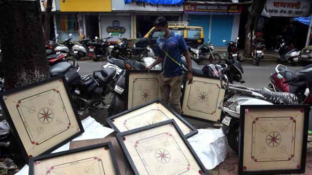 A shopkeeper keeps carrom boards out to dry a day after heavy rains flooded shops in Parel on September 24. According to BMC data, on August 1, five months after the first case was reported in Mumbai, the number of tests done was over five lakh. However, that number rose to over 10 lakh by September 22. This also means that testing doubled in a period of around 50 days. (Satish Bate / HT Photo) A shopkeeper keeps carrom boards out to dry a day after heavy rains flooded shops in Parel on September 24. According to BMC data, on August 1, five months after the first case was reported in Mumbai, the number of tests done was over five lakh. However, that number rose to over 10 lakh by September 22. This also means that testing doubled in a period of around 50 days. (Satish Bate / HT Photo)