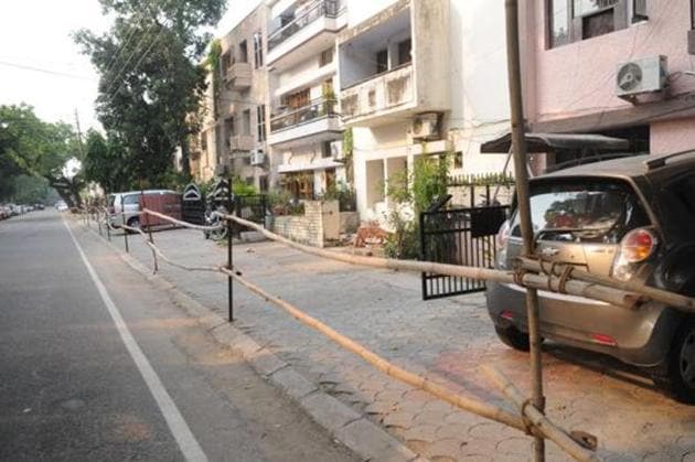A part of a locality is sealed as part of a micro-containment zone. (HT FIle Photo) A part of a locality is sealed as part of a micro-containment zone. (HT FIle Photo)