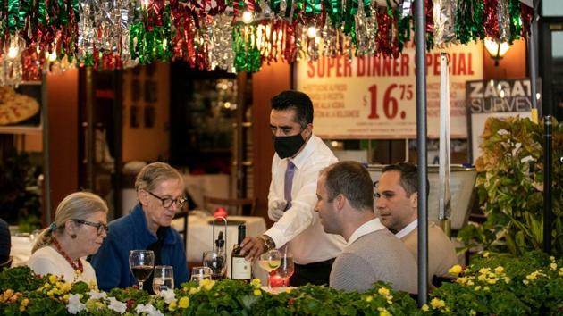 People enjoy outdoor dining amid the coronavirus disease (COVID-19) outbreak in Manhattan, New York City, US.(REUTERS)
