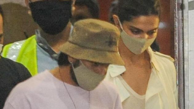 Deepika Padukone and Ranveer Singh arrive at Mumbai International Airport, after the former was summoned by NCB.(PTI)