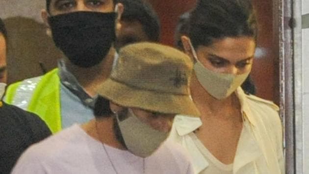 Bollywood actors Deepika Padukone and Ranveer Singh arrive at Mumbai International Airport, after the former was summoned by NCB in a Bollywood drugs probe.(PTI)