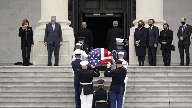 The flag-draped casket of Justice Ruth Bader Ginsburg is carried by a joint services military honor guard to lie in state at the US Capitol, Friday, Sept. 25, 2020, in Washington.(AP) The flag-draped casket of Justice Ruth Bader Ginsburg is carried by a joint services military honor guard to lie in state at the US Capitol, Friday, Sept. 25, 2020, in Washington.(AP)
