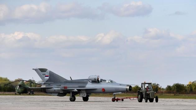A photo taken on October 13, 2016, shows ground crew preparing a Serbian Air Force Mig 21 fighter jet for a flight at the military airport Batajnica, near Belgrade.(AFP) A photo taken on October 13, 2016, shows ground crew preparing a Serbian Air Force Mig 21 fighter jet for a flight at the military airport Batajnica, near Belgrade.(AFP)