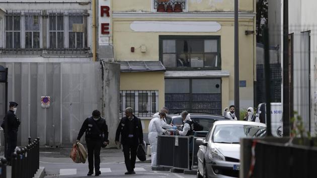 Police officers leave the scene after a knife attack near the former offices of satirical newspaper Charlie Hebdo, Friday Sept. 25, 2020 in Paris. French terrorism authorities are investigating a stabbing of two people Friday outside the former offices of the satirical newspaper Charlie Hebdo in Paris, and two suspects have been arrested, authorities said.(AP)