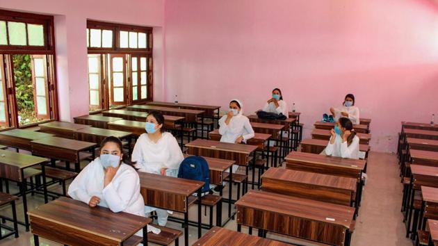 Students attending a class at a school in Srinagar on September 21.(PTI)