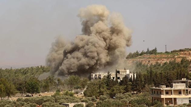 Smoke billows following an airstrike on the western outskirts of the Syrian province of Idlib, on September 20. (AFP)