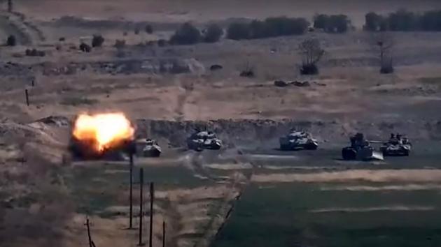 An image grab taken from a video made available on the official web site of the Armenian Defence Ministry on September 27, 2020, allegedly shows destroying of Azeri military vehicles during clashes between Armenian separatists and Azerbaijan in the breakaway region of Nagorno-Karabakh.(AFP)