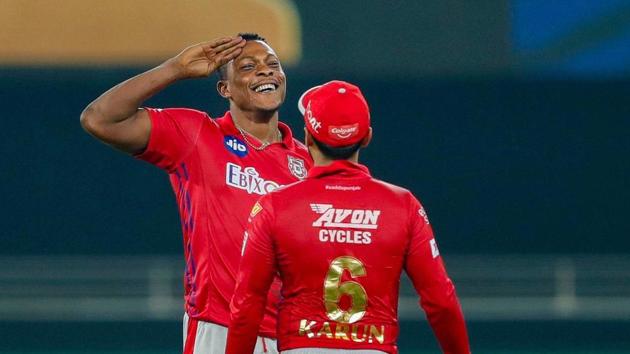 Dubai: Kings XI Punjab player Sheldon Cottrell reacts after taking the wicket of Delhi Capitals player Axar Patel during the cricket match of IPL 2020.(PTI) Dubai: Kings XI Punjab player Sheldon Cottrell reacts after taking the wicket of Delhi Capitals player Axar Patel during the cricket match of IPL 2020.(PTI)