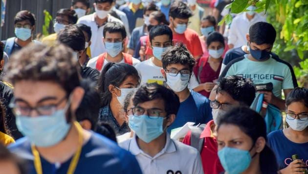 Gurugram: Students step out of an examination centre after appearing in Joint Entrance Examination-Advanced 2020, during Unlock 4.0, in Gurugram, Sunday(PTI)