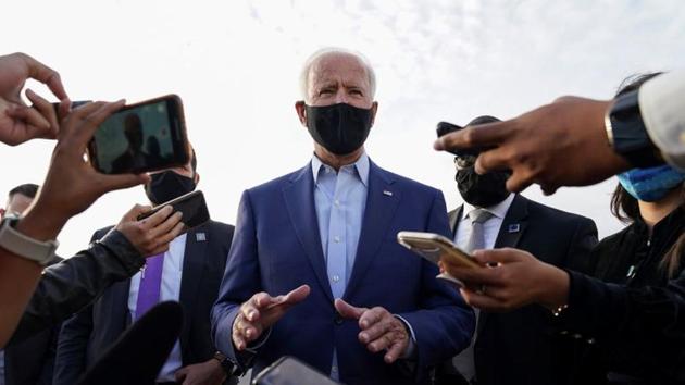 US Democratic presidential candidate Joe Biden speaks to reporters upon his departure after campaigning in Charlotte, North Carolina.(REUTERS) US Democratic presidential candidate Joe Biden speaks to reporters upon his departure after campaigning in Charlotte, North Carolina.(REUTERS)