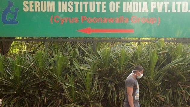 A man walks past a signpost of India's Serum Institute, the world's largest maker of vaccines, which is developing a vaccine against the coronavirus disease (COVID-19) at its laboratory in Pune.(REUTERS) A man walks past a signpost of India's Serum Institute, the world's largest maker of vaccines, which is developing a vaccine against the coronavirus disease (COVID-19) at its laboratory in Pune.(REUTERS)
