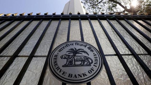 The Reserve Bank of India (RBI) seal is pictured on a gate outside the RBI headquarters in Mumbai.(REUTERS)