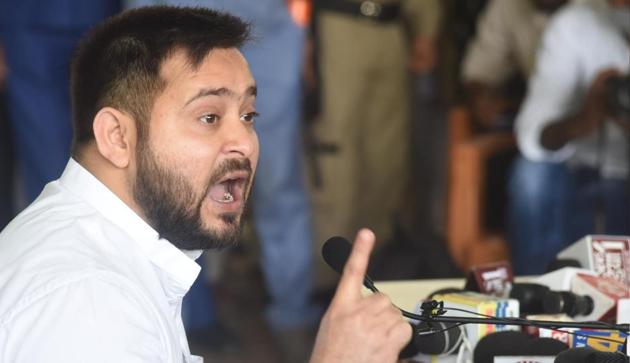 RJD leader Tejashwi Yadav addressing a press conference at the party office in Patna on Sunday.(Santosh Kumar//HT PHOTO)