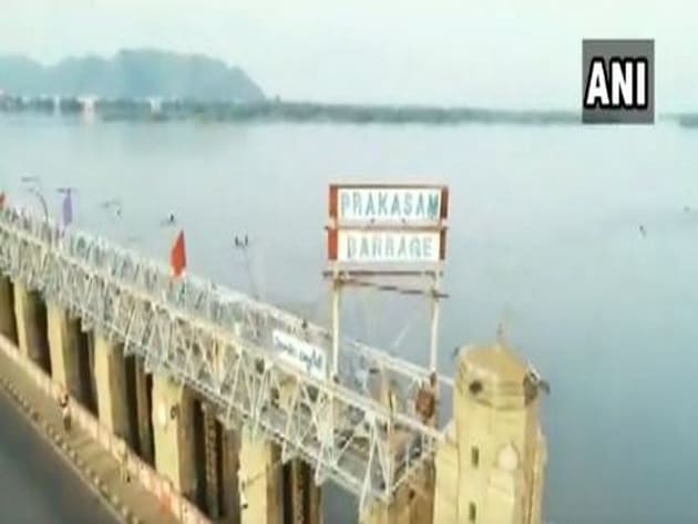 On Saturday, the Irrigation Department officials had said, the Prakasam Barrage received around 1 lakh cusec of floodwater from upper areas and that the water was released downwards into the Krishna canals and towards the Bay of Bengal.(ANI Photo) On Saturday, the Irrigation Department officials had said, the Prakasam Barrage received around 1 lakh cusec of floodwater from upper areas and that the water was released downwards into the Krishna canals and towards the Bay of Bengal.(ANI Photo)
