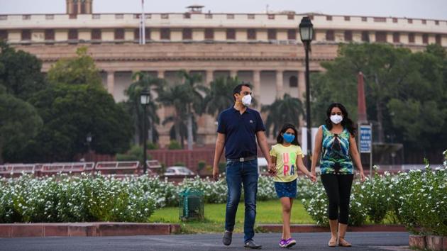 A family at Vijay Chowk in New Delhi on September 26. India remains the second worst affect country by the virus, behind only the United States. India’s case fatality rate (CFR) at 1.6% remains nearly half of the global average of 3.1%. The number of deaths reported in the country per million population has seen a jump of 42% in September alone — from 50 deaths per million to 71, HT reported. (Amal KS / HT Photo) A family at Vijay Chowk in New Delhi on September 26. India remains the second worst affect country by the virus, behind only the United States. India’s case fatality rate (CFR) at 1.6% remains nearly half of the global average of 3.1%. The number of deaths reported in the country per million population has seen a jump of 42% in September alone — from 50 deaths per million to 71, HT reported. (Amal KS / HT Photo)