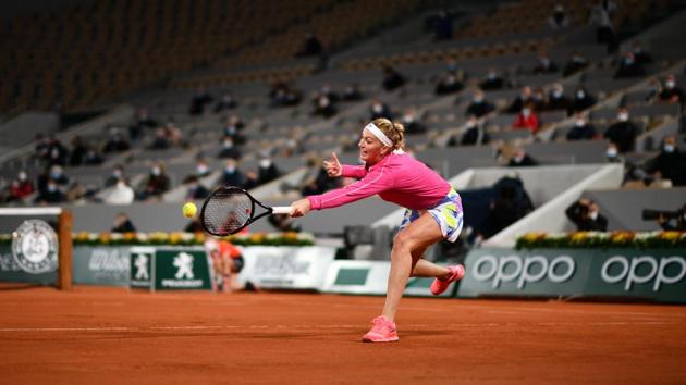 Czech Republic's Petra Kvitova plays a forehand return to France's Oceane Dodin during their women's singles first round tennis match at the Philippe Chatrier court on Day 2 of The Roland Garros 2020 French Open tennis tournament in Paris.(AFP)