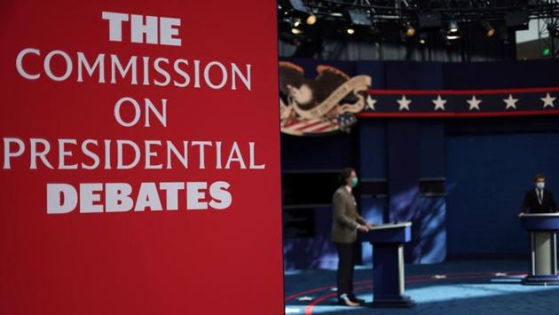 Students stand at the stage as technicians prepare for the first presidential debate on the campus of the Cleveland Clinic in Cleveland, Ohio on September 28. This first of three presidential debates is being held in Cleveland, and the following debates will take place in Miami and Nashville respectively. (Jonathan Ernst / REUTERS)