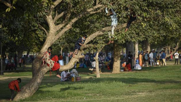 Children seen playing in the lawns of India Gate in New Delhi on September 27. There are 9,47,576 active Covid-19 cases, while 51,01,398 patients have been cured or discharged from hospitals as of September 29. (Biplov Bhuyan / HT Photo) Children seen playing in the lawns of India Gate in New Delhi on September 27. There are 9,47,576 active Covid-19 cases, while 51,01,398 patients have been cured or discharged from hospitals as of September 29. (Biplov Bhuyan / HT Photo)