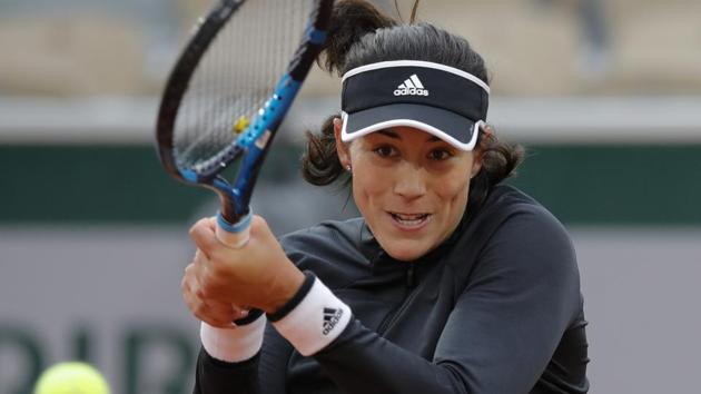 Spain's Garbine Muguruza plays a shot against Tamara Zidansek of Slovenia in the first round match of the French Open.(AP)