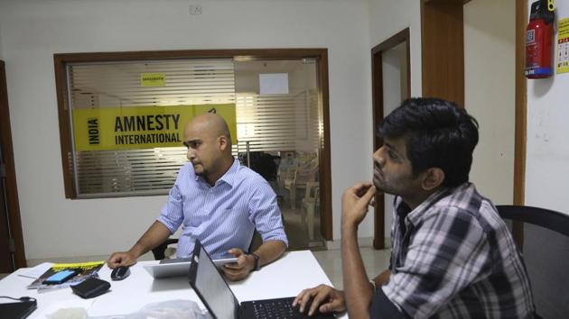 BJP’s national spokesperson Rajyavardhan Rathore said Amnesty International had set up four companies, and showed money received in their account as FDI.(AP)