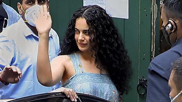 Bollywood actor Kangana Ranaut waves as she arrives at her office, where the Brihanmumbai Municipal Corporation conducted a demolition drive, at Pali Hill in Mumbai.(PTI)