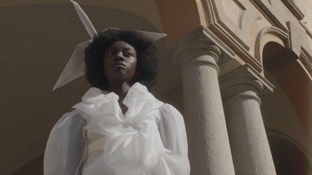 A model presents a creation from the Frida Kiza Spring/Summer2021 collection by Fabiola Manirakiza during the "We Are Made in Italy" digital show at Milan Fashion Week, organised by the Black Lives Matter in Italian fashion collective, in Milan, Italy, in this still image taken from video released on September 27, 2020. (via REUTERS)