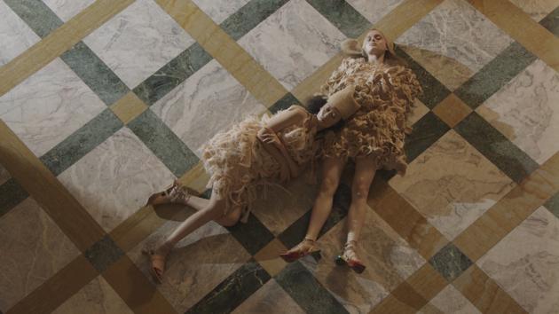 Models present creations from the Spring/Summer2021 collection by Claudia Gisele Ntsama during the "We Are Made in Italy" digital show at Milan Fashion Week, organised by the Black Lives Matter in Italian fashion collective, in Milan, Italy, in this still image taken from video released on September 27, 2020. (via REUTERS)