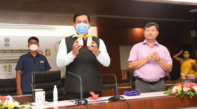 Assam chief minister Sarnananda Sonowal launching the TRISSAM brand of forest based products made by tribal communities at Guwahati on Wednesday.(HT PHOTO.)