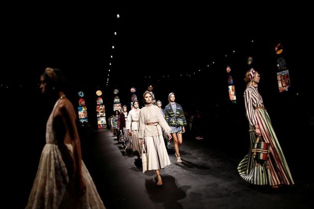 Models present creations by designer Maria Grazia Chiuri as part of her Spring/Summer 2021 ready-to-wear collection show for fashion house Dior during Paris Fashion Week in Paris, France, September 29, 2020. (REUTERS)