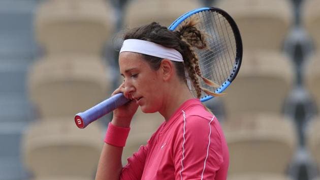 Victoria Azarenka of Belarus reacts after missing a shot against Slovakia's Anna Karolina Schmiedlova in the second round match of the French Open tennis tournament at the Roland Garros stadium in Paris, France, Wednesday, Sept. 30, 2020.(AP)