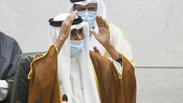The new Emir of Kuwait Sheikh Nawaf Al Ahmad Al Sabah, waves after he performed the constitutional oath at the Kuwaiti National Assembly in Kuwait, Wednesday.(AP)
